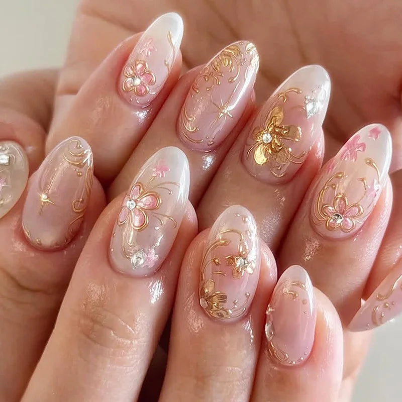 24pcs Glitter Cat Eye Fake Nails Medium Almond False Nails Golden Irregular Line Nail Art French Flower Pearl Press on Nails (C)